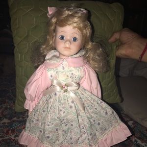 Blue eyes porcelain doll